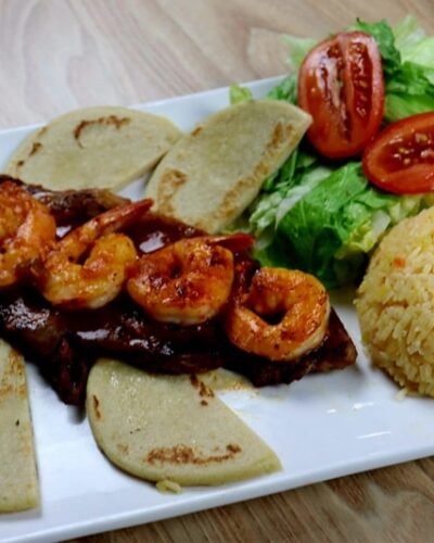Descubre el auténtico sabor latino en Los Amigos Latin Grill. Prueba "El Migueleño", un plato que te hará sentir en casa. ¡Te esperamos en Forest Park, GA!